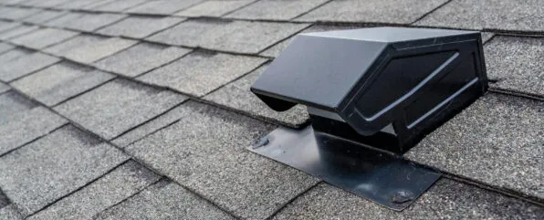 Static vent installed on a shingle roof for passive attic ventilation with proper flashing