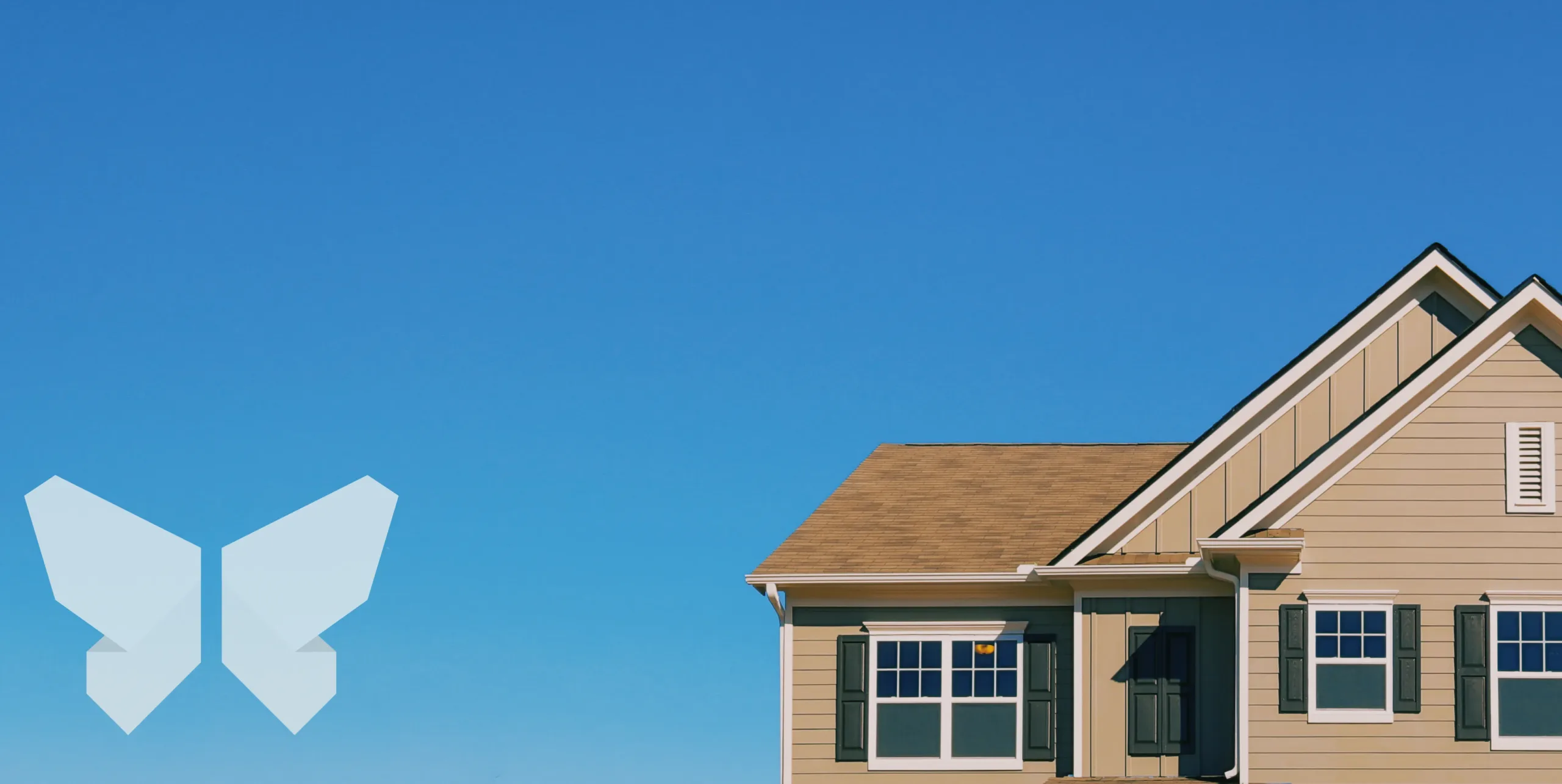 DaBella Logo in a blue sky next to a home with James Hardie fiber cement siding