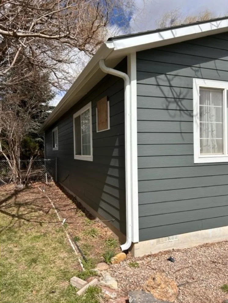 New Premier gutters and James Hardie fiber cement in Iron Gray located in Wilder, ID done by DaBella.
