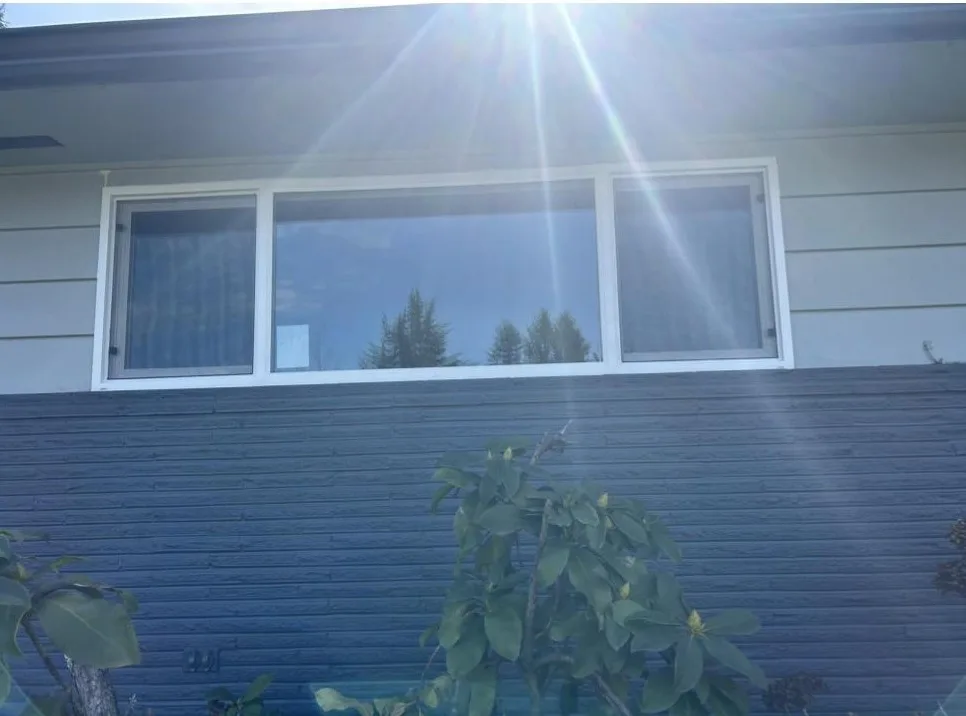 Family in Portland, OR with brand new vinyl replacement windows done by DaBella.